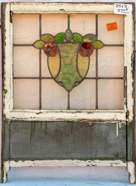 FRENCH ART NOUVEAU STAINED GLASS PANEL: French Art Nouveau stained glass panel with a central medallion of flowers and leaves. Approximate dimensions: h. 31", w. 25" Disclaimer: This is an online court ordered bankruptcy sale. Participating