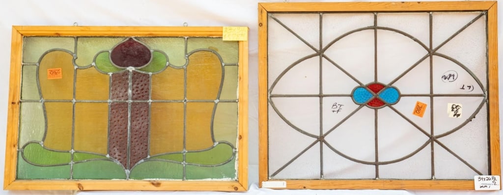 TWO FRENCH STAINED GLASS PANELS: Two French stained glass panels with textured stained glass accents. Approximate dimensions: h. 26.5", w. 34" Disclaimer: This is an online court ordered bankruptcy sale. Participating bidders must ha