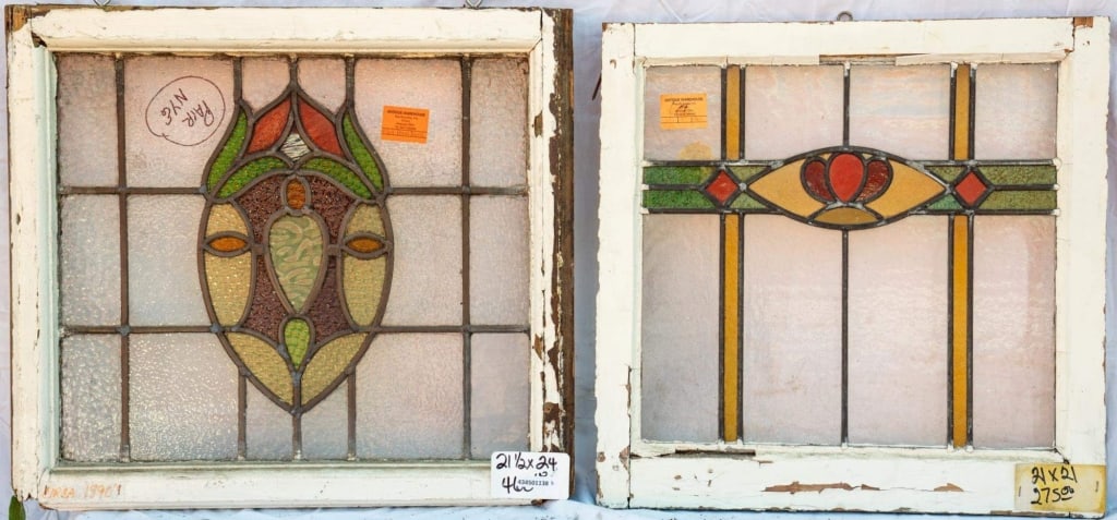 TWO FRENCH STAINED GLASS PANELS: Two French stained glass panels, one with a multicolored central medallion, the other with a floral motif. Approximate dimensions: h. 21.5", w. 24" Disclaimer: This is an online court ordered bankrupt
