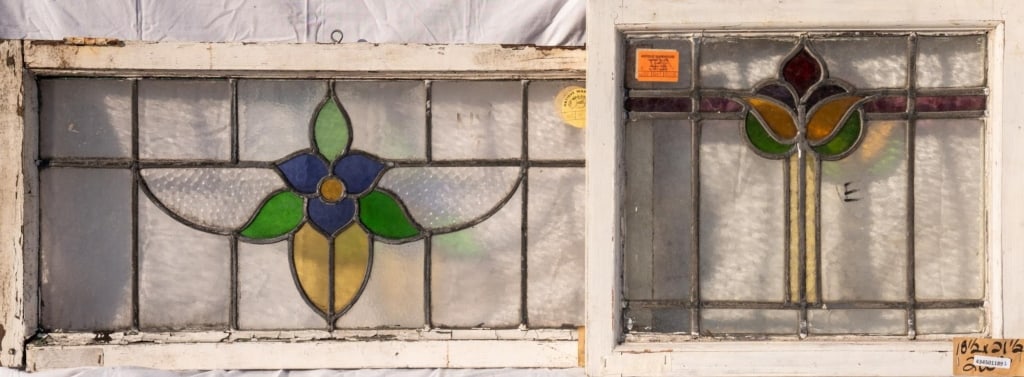 PAIR OF FRENCH STAINED GLASS PANELS: Pair of French stained glass panels with floral medallions. Approximate dimensions: h. 16", w. 32.5" Disclaimer: This is an online court ordered bankruptcy sale. Participating bidders must have a cred