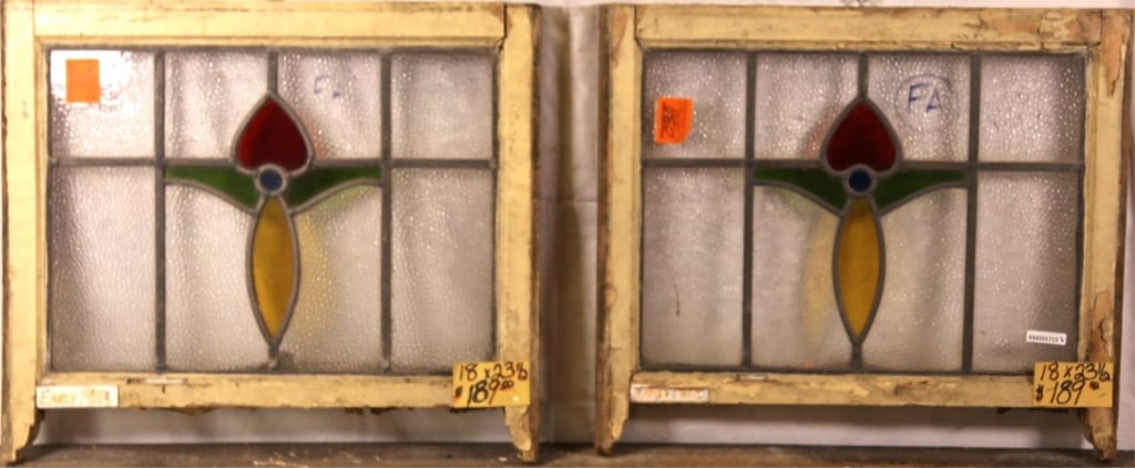 PAIR OF CONTINENTAL ART NOUVEAU STAINED GLASS PANE: Pair of Continental Art Nouveau stained glass panels with floral motif. Approximate dimensions: h. 18", w. 23.5" Disclaimer: This is an online court ordered bankruptcy sale. Participating bidders must