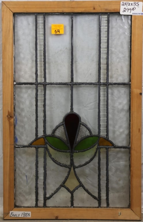 ANTIQUE CONTINENTAL STAINED GLASS PANEL: Antique Continental stained glass panel with red, amber, and green medallion and colorless leaded glass panels. Approximate dimensions: h. 35", w. 22.5 Disclaimer: This is an online court ordered bank