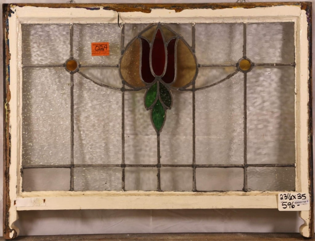 FRENCH ART NOUVEAU STAINED GLASS PANEL: French Art Nouveau stained glass panel with floral medallion. Approximate dimensions: h. 23.5", w. 35" Disclaimer: This is an online court ordered bankruptcy sale. Participating bidders must have a cr