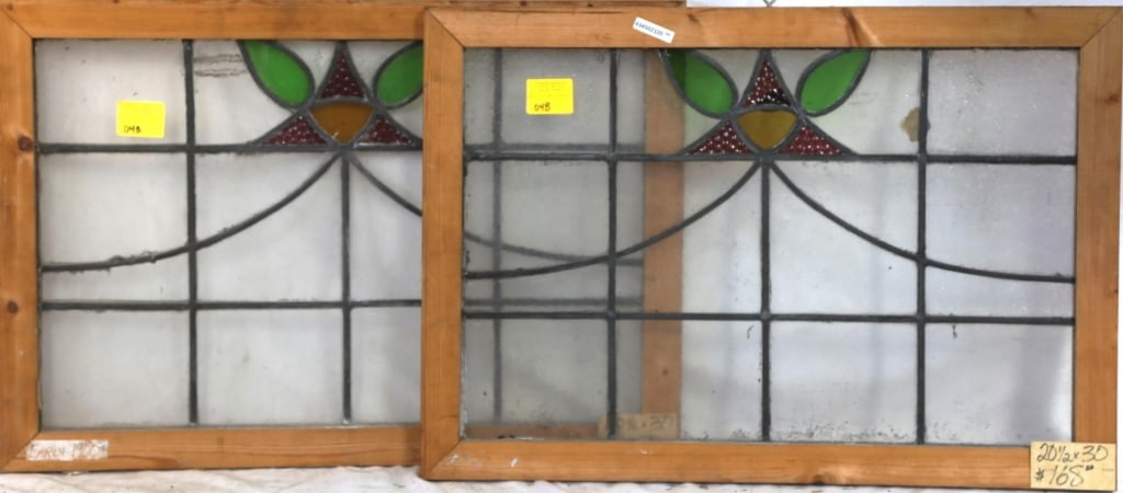 PAIR OF CONTINENTAL STAINED GLASS PANELS: Pair of Continental stained glass panels with floral medallions. Approximate dimensions: h. 20.5", w. 30" Disclaimer: This is an online court ordered bankruptcy sale. Participating bidders must have a