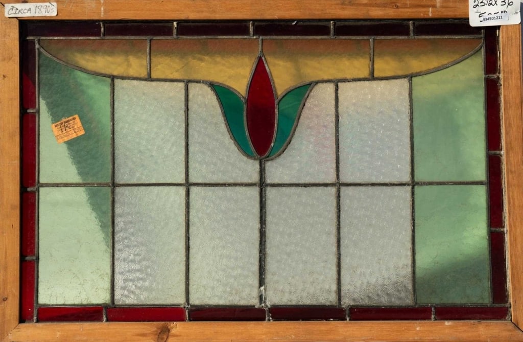 FRENCH ART NOUVEAU STAINED GLASS PANEL: French Art Nouveau stained glass panel with a floral motif. Approximate dimensions: h. 23.5", w. 26" Disclaimer: This is an online court ordered bankruptcy sale. Participating bidders must have a cred