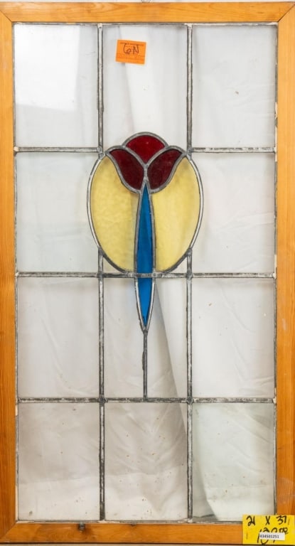 ANTIQUE ENGLISH STAINED GLASS PANEL: Antique English stained glass panel with a floral medallion and colorless leaded glass panels. Approximate dimensions: h. 37", w. 21" Disclaimer: This is an online court ordered bankruptcy sale. Parti
