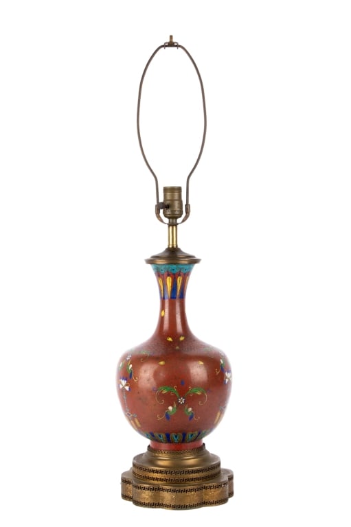 ASIAN CLOISONNE TABLE LAMP WITH BRONZE BASE: Asian cloisonne table lamp with bronze flower-shaped base. Approximate dimensions: h. 31", dia. 8" Disclaimer: Participating bidders must have a credit card on file with LiveAuctioneers in order for t