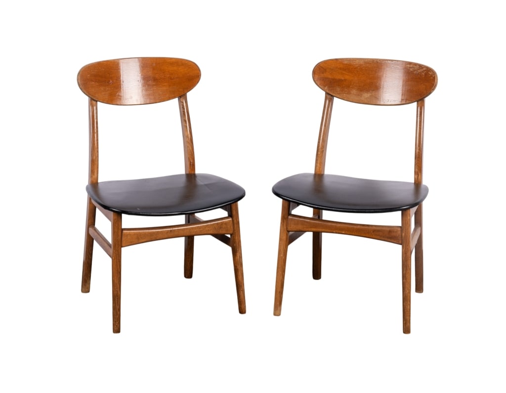 PAIR OF INTERCONTINENTAL FURNITURE MCM CHAIRS: Intercontinental Furniture. Pair of MCM chairs with walnut veneer frames and black vinyl upholstered seats. Approximate dimensions: h. 33", w. 21", d. 16" Disclaimer: Participating bidders must have
