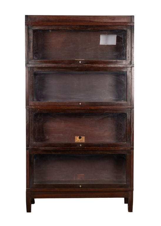 GLOBE-WERNICKE FOUR-SECTION BOOKCASE: Globe-Wernicke four-section bookcase. Approximate dimensions: h. 62.6", w. 34.5", d. 11.5" Disclaimer: Participating bidders must have a credit card on file with LiveAuctioneers in order for their