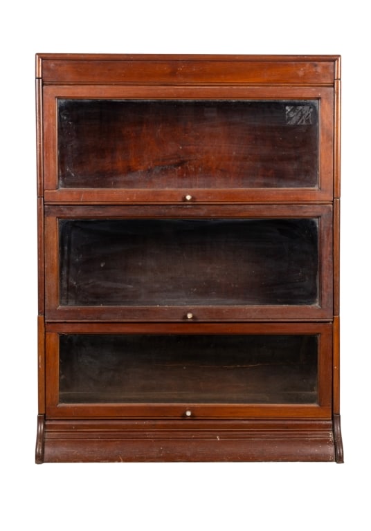 EARLY 20TH CENTURY THREE-SECTION BOOKCASE: Early 20th century three-section bookcase. Approximate dimensions: h. 46", w. 34.5", d. 14.5" Disclaimer: Participating bidders must have a credit card on file with LiveAuctioneers in order for their 