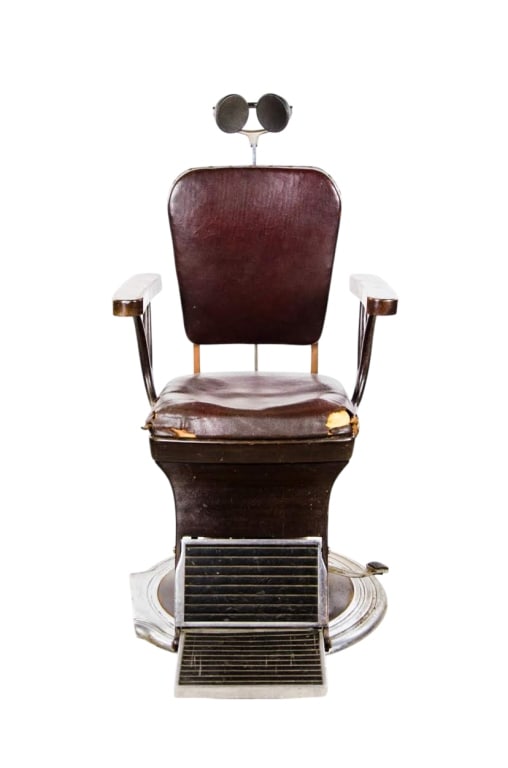 AMERICAN OPTICA CO. OPHTHALMIC CHAIR: American Optica Co. ophthalmic chair with burgundy leather upholstery. Approximate dimensions: h. 46", w. 23.5", d. 34" Disclaimer: Participating bidders must have a credit card on file with