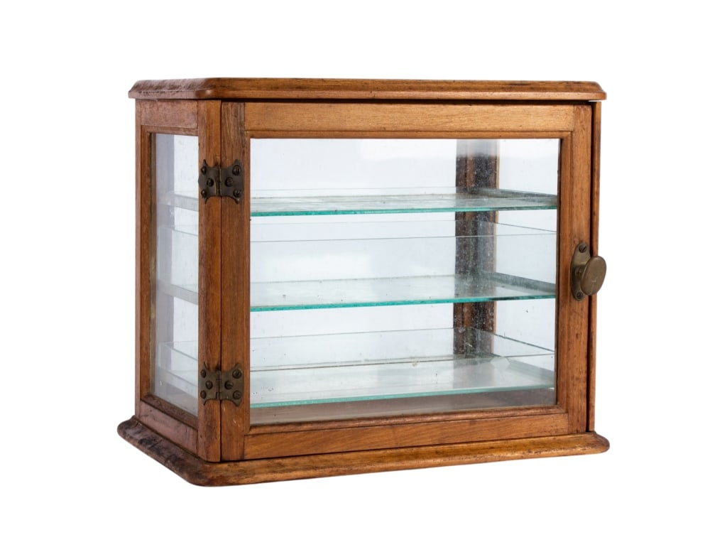 VINTAGE TABLETOP MEDICAL CABINET: Vintage tabletop medical cabinet with glass drawers. Approximate dimensions: h. 12", w. 13.5", d. 8.5" Disclaimer: Participating bidders must have a credit card on file with LiveAuctioneers in order