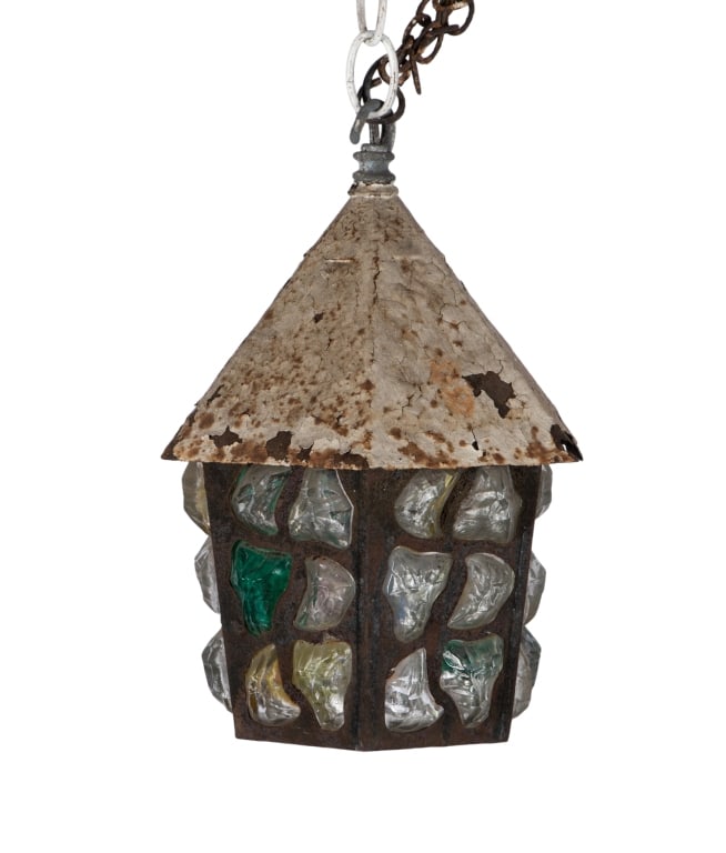 ENGLISH ARTS & CRAFTS STYLE STAINED GLASS LANTERN: English Arts and Crafts style lantern with stained glass inserts. Approximate dimensions: h. 11.5", w. 8", d. 8" Disclaimer: Participating bidders must have a credit card on file with LiveAuctioneers