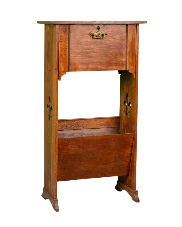 EARLY 20TH CENTURY AMERICAN SMOKE STAND: Early 20th century American smoke stand with newspaper holder. Approximate dimensions: h. 33", w. 18", d. 9.5" Disclaimer: Participating bidders must have a credit card on file with LiveAuctioneers