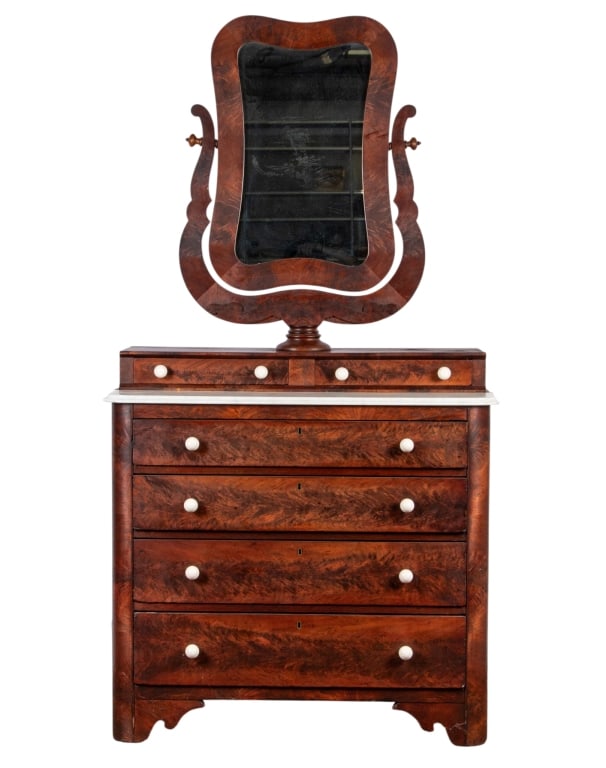 EMPIRE STYLE MAHOGANY GENTLEMAN?S CHEST WITH MIRRO: Late 19th century. Empire style mahogany gentleman?s chest with mirror with lyre form shaving mirror and porcelain knobs. Approximate dimensions: h. 83", w. 41", d. 21" Disclaimer: Participating