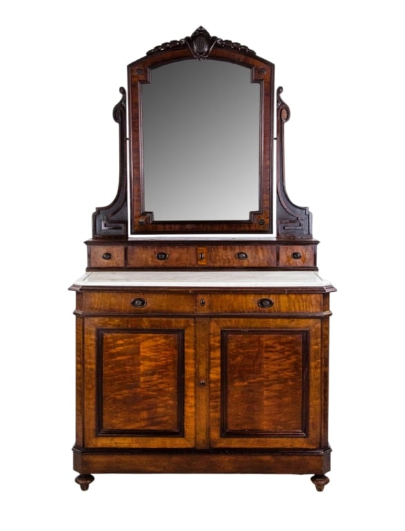 VICTORIAN MARBLE TOP DRESSER: Victorian marble top dresser with carved details. Approximate dimensions: h. 74", w. 42", d. 21" Disclaimer: Participating bidders must have a credit card on file with LiveAuctioneers in order for