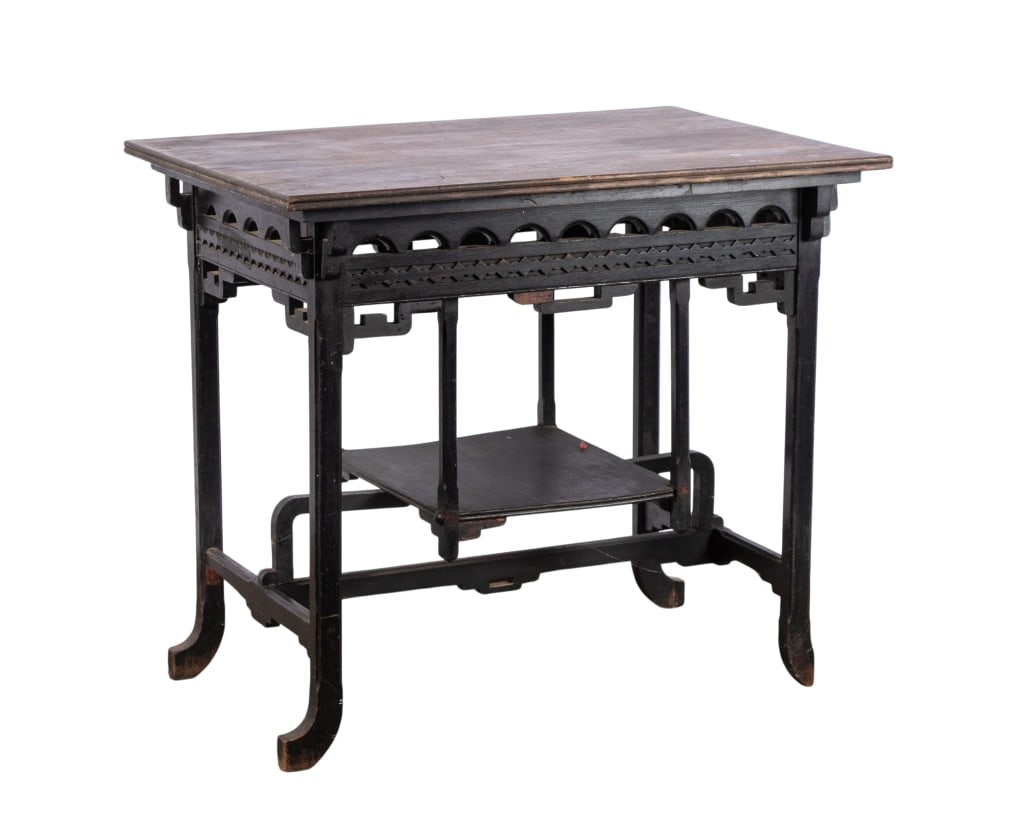 AESTHETIC MOVEMENT EBONIZED CENTER TABLE: 19th century Aesthetic Movement ebonized center table with intricate carved details. Approximate dimensions: h. 29", w. 33.5", d. 23.5"" Disclaimer: Participating bidders must have a credit card on fi