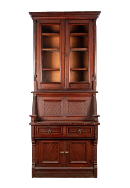 DROP FRONT SECRETARY DESK: Drop front secretary desk with inset carved panels, and carved details throughout. Approximate dimensions: h. 94", w. 39", d. 22" Disclaimer: Participating bidders must have a credit card on file