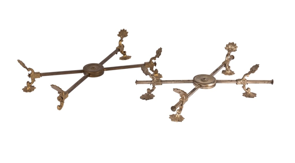 TWO VINTAGE ADJUSTABLE BRASS TRIVET STANDS: Two vintage adjustable brass trivet stands. Approximate dimensions: h. 1.5", w. 13" Disclaimer: Participating bidders must have a credit card on file with LiveAuctioneers in order for their bidding re