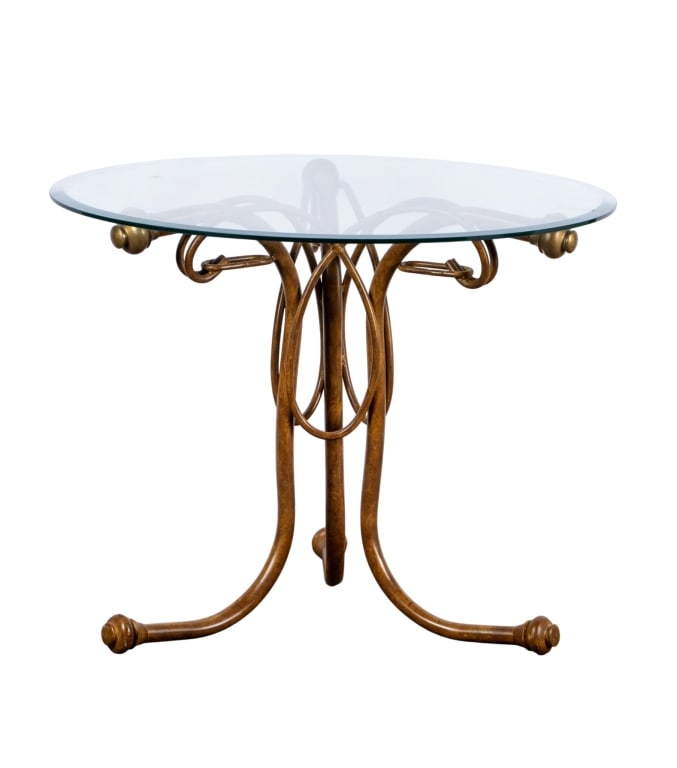 MODERN METAL & GLASS ACCENT TABLE: Modern metal & glass accent table. Approximate dimensions: h. 27", dia. 34" Disclaimer: Participating bidders must have a credit card on file with LiveAuctioneers in order for their bidding registrati