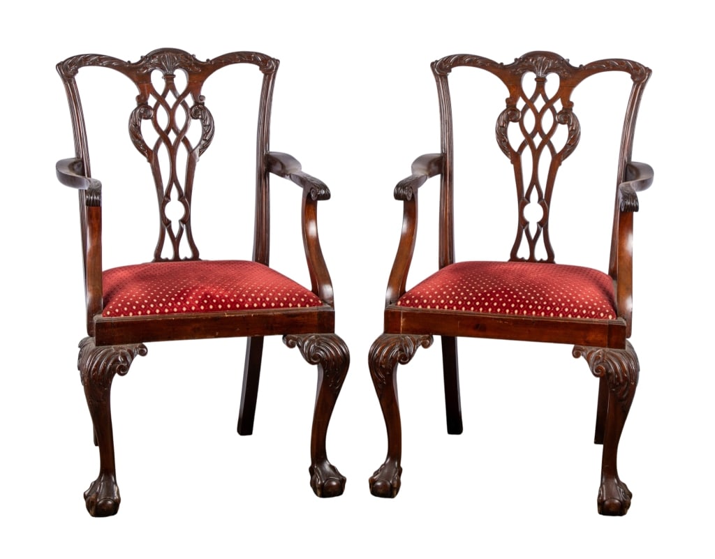 PAIR OF CHIPPENDALE STYLE ARMCHAIRS: Pair of Chippendale style armchairs with ball & claw feet and carved backs. Approximate dimensions: h. 39", w. 24", d. 21" Disclaimer: Participating bidders must have a credit card on file with LiveAu