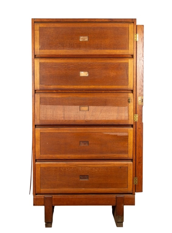 MID-CENTURY RAF STAVERTON OAK CABINET: Mid-Century RAF Staverton oak cabinet with 5 drawers. Marked to the back. Approximate dimensions: h. 73.5" w. 36.5", d. 15" Disclaimer: Participating bidders must have a credit card on file with