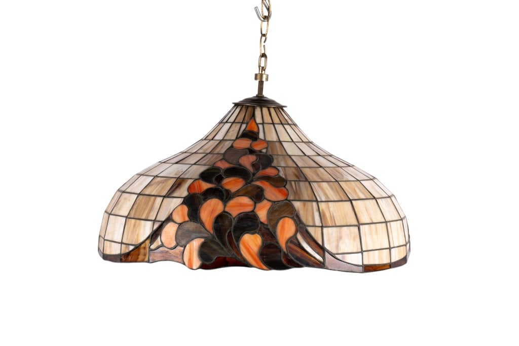 TIFFANY STYLE STAINED GLASS PENDANT LIGHT: Tiffany style stained glass pendant light with whispy glass accents. Approximate dimensions: h. 16", dia. 21" Disclaimer: Participating bidders must have a credit card on file with LiveAuctioneers in