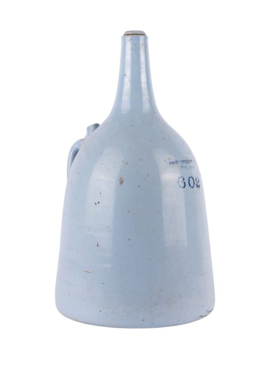 VINTAGE BLUE GLAZED STONEWARE MILK JUG: Vintage blue glazed stoneware milk jug. Marked to the side. Approximate dimensions: h. 15", dia. 9.5" Disclaimer: Participating bidders must have a credit card on file with LiveAuctioneers in order