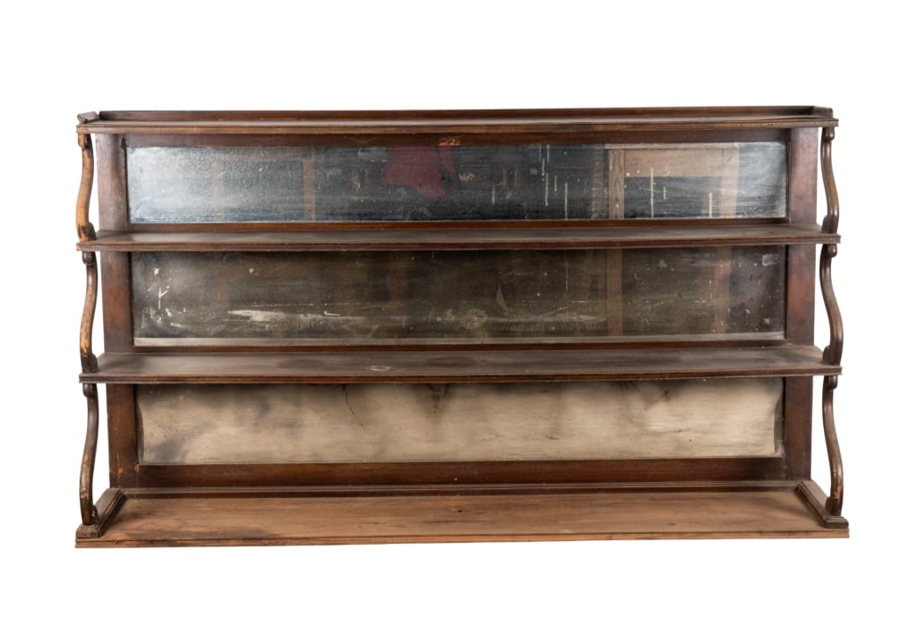 MIRRORED WALL SHELF: Mirrored wall shelf. Approximate dimensions: h. 36.5", w. 65", d. 13" Disclaimer: Participating bidders must have a credit card on file with LiveAuctioneers in order for their bidding registration to 