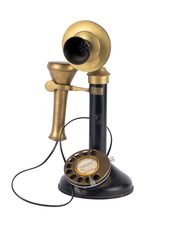 VINTAGE BRASS ROTARY TELEPHONE: Vintage brass rotary telephone. Approximate dimensions: h. 12", w. 7" Disclaimer: Participating bidders must have a credit card on file with LiveAuctioneers in order for their bidding registration to