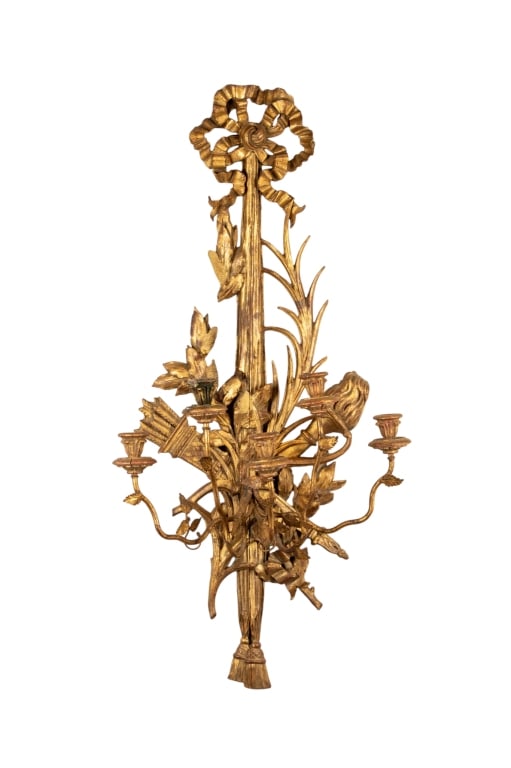 20TH CENTURY FRENCH GILT WOOD WALL SCONCE: 20th century French gilt wood wall sconce with leaf details to arms. Approximate dimensions: h. 37", w. 18", d. 12.5" Disclaimer: Participating bidders must have a credit card on file with
