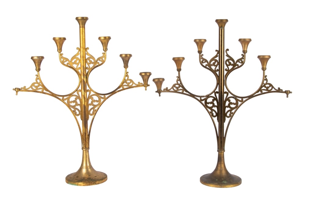 PAIR OF ART DECO STYLE BRASS CANDELABRAS: Pair of Art Deco style brass candelabras. Approximate dimensions: h. 29.5", w. 24.5", d. 8" Disclaimer: Participating bidders must have a credit card on file with LiveAuctioneers in order for their