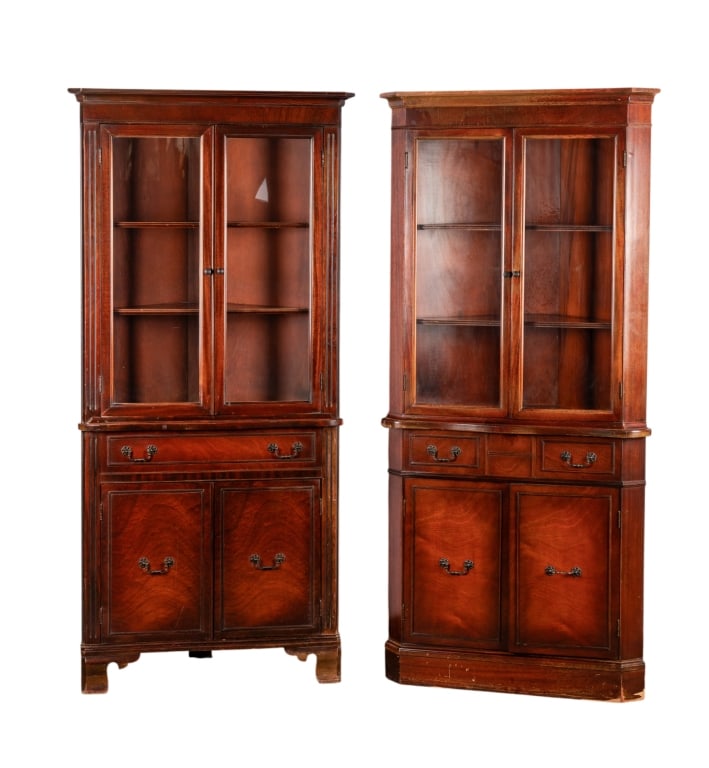 NEAR PAIR OF MAHOGANY DISPLAY CORNER CABINETS: Near pair of mahogany display corner cabinets. Approximate dimensions: h. 71", w. 32", d. 23.5" Disclaimer: Participating bidders must have a credit card on file with LiveAuctioneers in order for