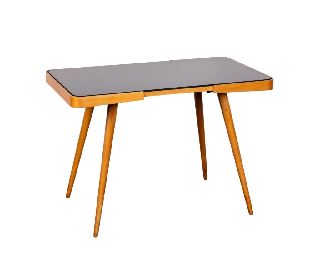 CHESKY NABYTEK WOOD & GLASS COFFEE TABLE: Chesky Nabytek wood & glass coffee table with black glass top. Approximate dimensions: h. 24", w. 34.5", d. 19.5" Disclaimer: Participating bidders must have a credit card on file with LiveAuctioneers