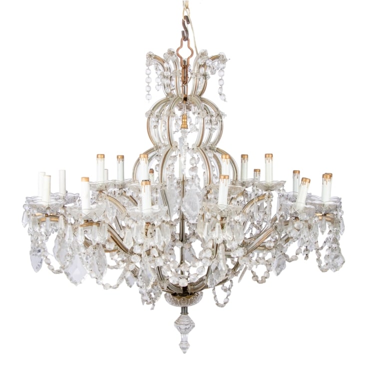 LARGE VENETIAN STYLE CHANDELIER: floral accents throughout, pendeloque shaped crystals, octagon Approximate dimensions: h. 38", dia. 38" Disclaimer: Participating bidders must have a credit card on file with LiveAuctioneers in order