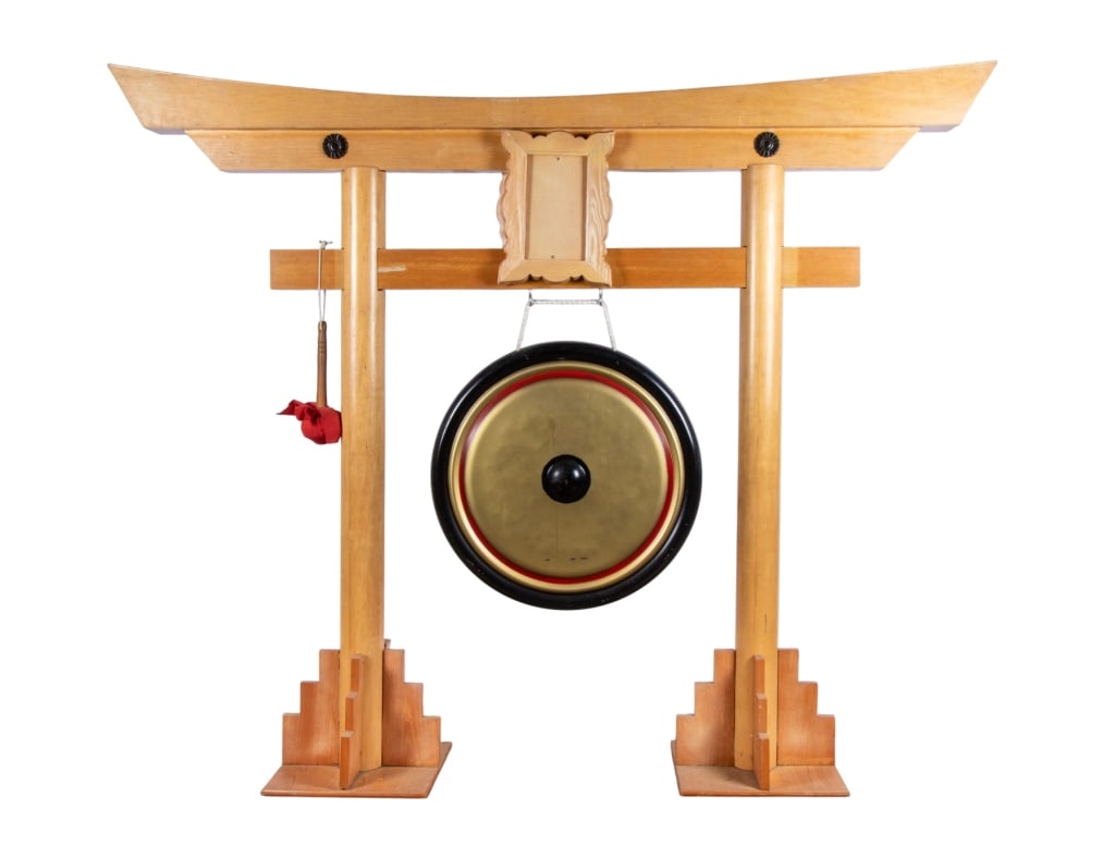 CONTEMPORARY LARGE CHINESE GONG: Contemporary large Chinese gong, decorative prop. Approximate dimensions: h. 72.5", w. 88", d. 17" Disclaimer: Participating bidders must have a credit card on file with LiveAuctioneers in order for