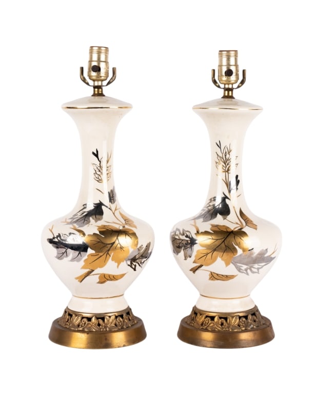 PAIR OF MID-CENTURY GLASS TABLE LAMPS: Pair of mid-century glass table lamps with floral design, gilt details, and brass base with vine motif. Approximate dimensions: h. 18", dia. 8" Disclaimer: Participating bidders must have a credit