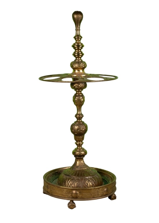 ANTIQUE BRASS UMBRELLA STAND: Antique brass umbrella stand with floral details throughout and ball & claw feet. Approximate dimensions: h. 44", dia. 19" Disclaimer: Participating bidders must have a credit card on file with