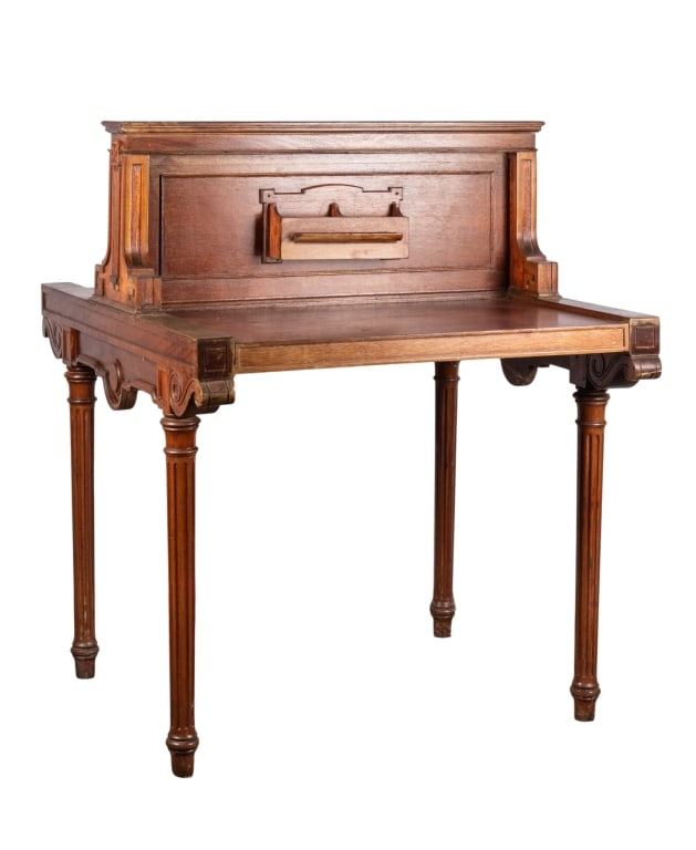 ENGLISH REGENCY STYLE BANK COUNTER: English Regency style bank counter with fluted legs and carved details. Approximate dimensions: h. 44.75", w. 35.5", d. 38" Disclaimer: Participating bidders must have a credit card on file with