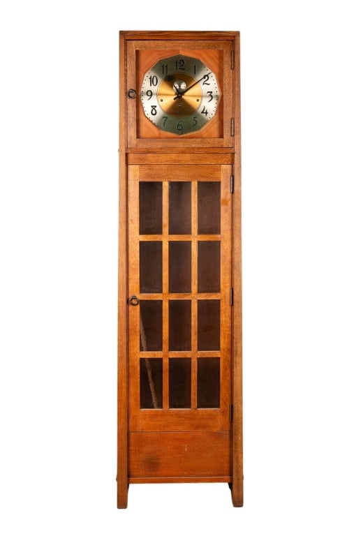 ARTS & CRAFTS STICKLEY TALL CASE CLOCK: Arts & Crafts Stickley tall case clock with marked and numbered, includes pendulum and weights. Approximate dimensions: h. 35", w. 46.5", d. 20" Disclaimer: Participating bidders must have a credit