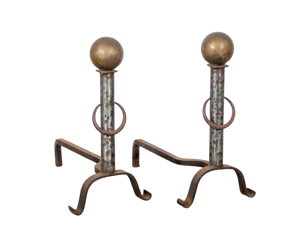 PAIR OF ARTS & CRAFTS WROUGHT IRON ANDIRONS: Pair of Arts & Crafts wrought iron andirons. Approximate dimensions: h. 20", w. 10", d. 19.5" Disclaimer: Participating bidders must have a credit card on file with LiveAuctioneers in order for their 