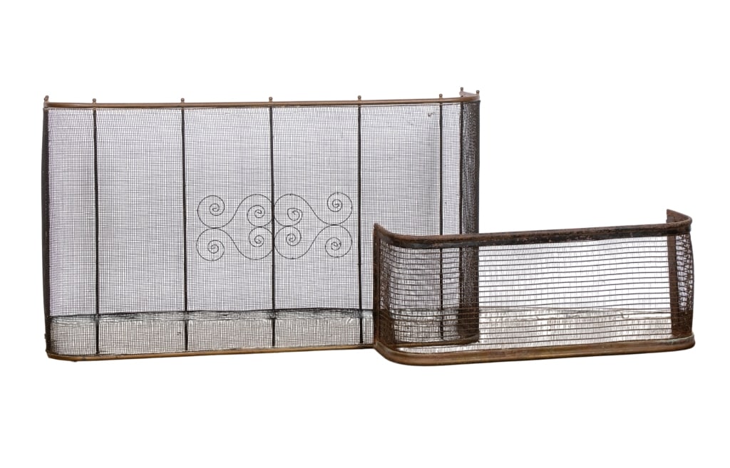 TWO METAL MESH FIREPLACE FENDERS: Two metal mesh fireplace fenders. Approximate dimensions: h. 24", w. 41.5", d. 12" Disclaimer: Participating bidders must have a credit card on file with LiveAuctioneers in order for their bidding