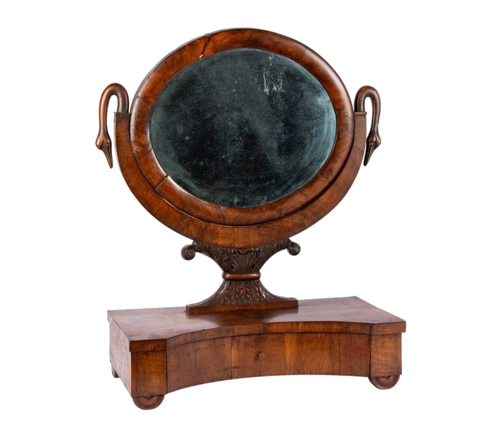 19TH CENTURY MAHOGANY DRESSING MIRROR: 19th century mahogany dressing mirror with swan details on the sides, one drawer, and carved base. Approximate dimensions: h. 30.5", w. 25", d. 11.5" Disclaimer: Participating bidders must have a