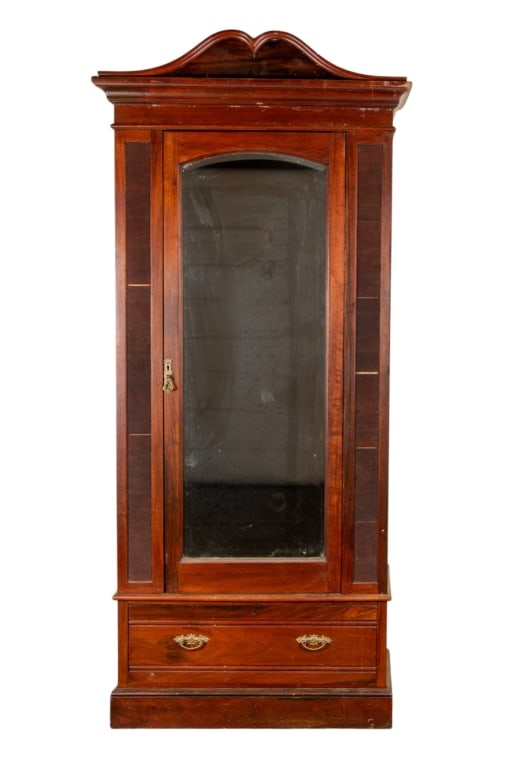 20TH CENTURY MAHOGANY MIRRORED WARDROBE: 20th century mahogany mirrored wardrobe with beveled mirror and brass hook inside. Approximate dimensions: h. 85", w. 34.5", d. 13" Disclaimer: Participating bidders must have a credit card on file wi