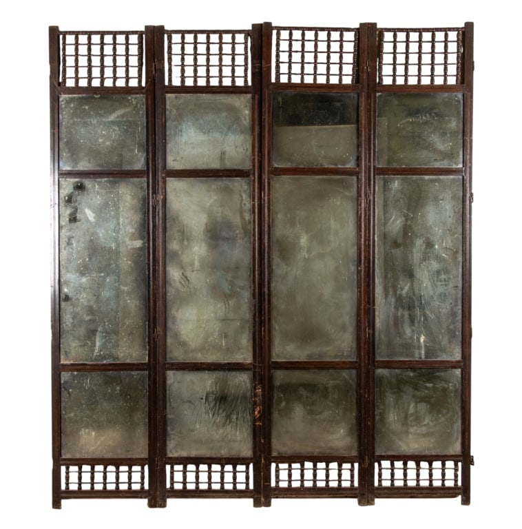 VINTAGE FOUR PANEL MIRRORED ROOM DIVIDER: Vintage four-panel room divider with distressed mirrors and carved details. Approximate dimensions: for two panels (one unit) h. 87", w. 38", d. 1" Disclaimer: Participating bidders must have a