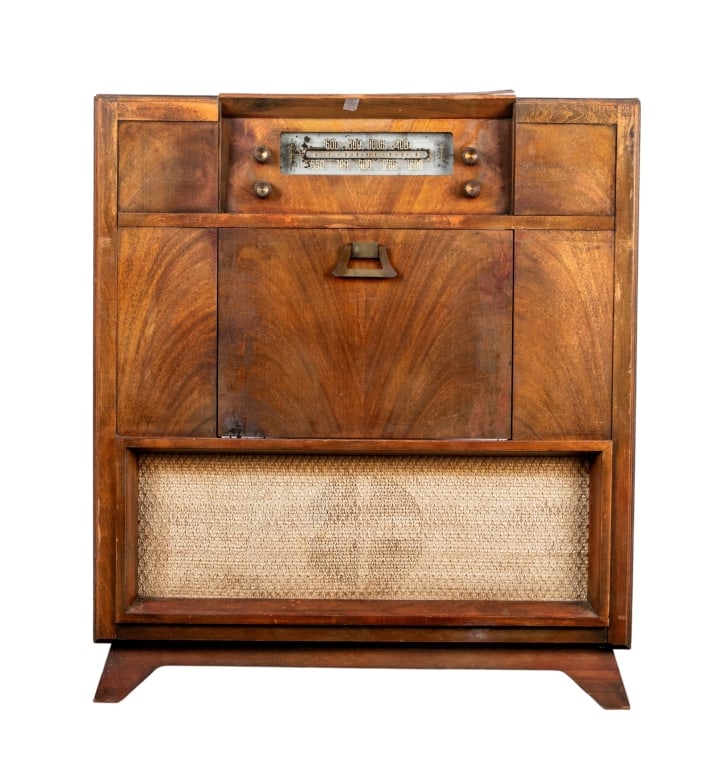 PHILCO TUBE RADIO WITH RECORD PLAYER: Philco tube radio with record player. Approximate dimensions: h. 34", w. 30", d. 14.5" Disclaimer: Participating bidders must have a credit card on file with LiveAuctioneers in order for their bidding