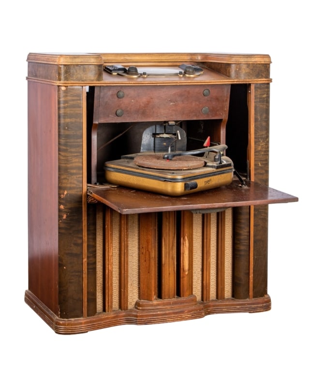 ZENITH TUBE RADIO WITH RECORD PLAYER: Zenith tube radio with record player. Approximate dimensions: h. 37", w. 31", d. 16" Disclaimer: Participating bidders must have a credit card on file with LiveAuctioneers in order for their bidding r