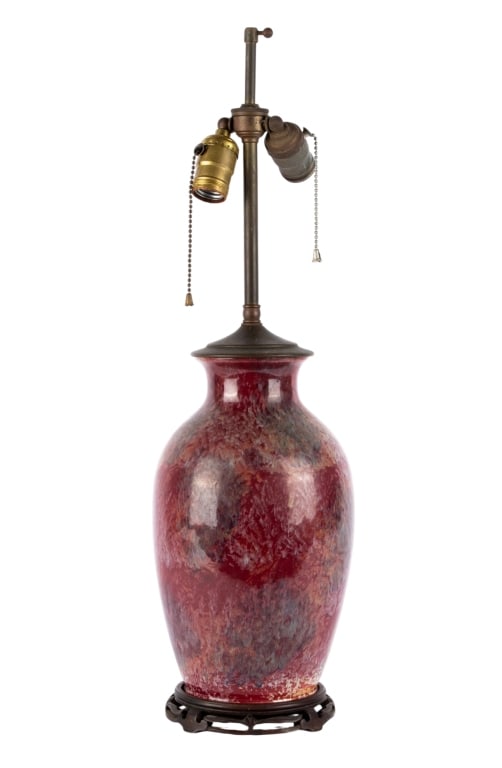 CHINESE DOUCAI CHING DYNASTY OXBLOOD TABLE LAMP: Chinese Doucai Qing Dynasty oxblood table lamp. Approximate dimensions: h. 24", dia. 7" Disclaimer: Participating bidders must have a credit card on file with LiveAuctioneers in order for their