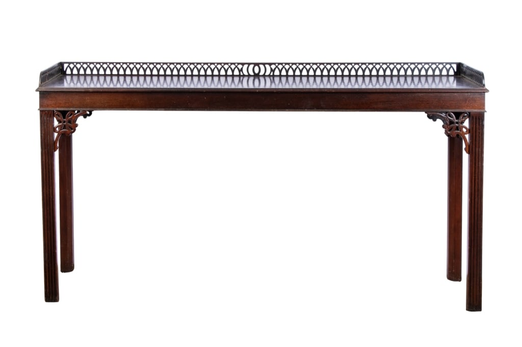 MAHOGANY CONSOLE WITH GALLERY: Mahogany console with gallery. Approximate dimensions: h. 59", w. 54", d. 16" Disclaimer: Participating bidders must have a credit card on file with LiveAuctioneers in order for their bidding