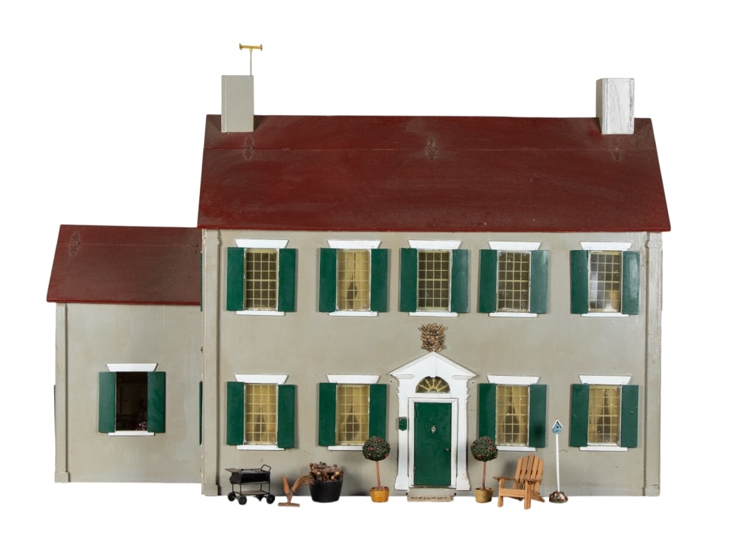 COLONIAL MANSION DOLLHOUSE: Colonial Mansion dollhouse. 8 rooms and an attic, with many details including furniture and household accessories. Approximate dimensions: h. 36", w. 48", d. 17" Disclaimer: Participating bidders